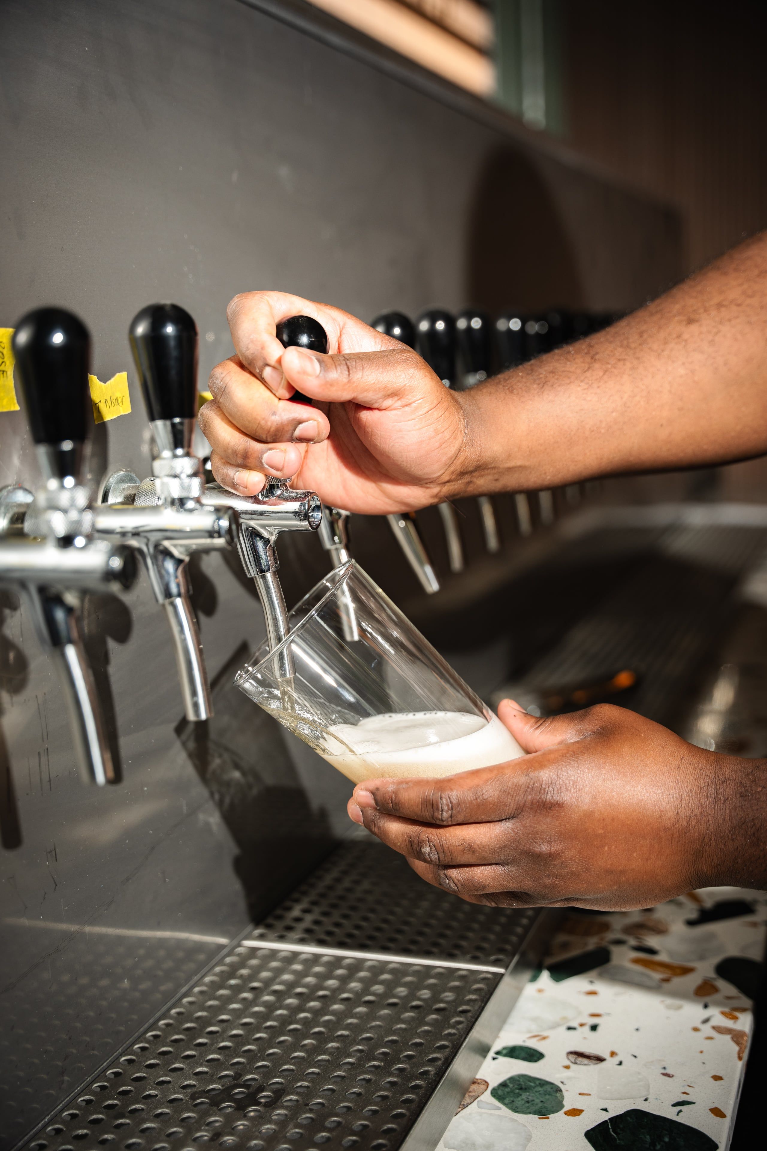 A beer being poured from the taps at Trickle